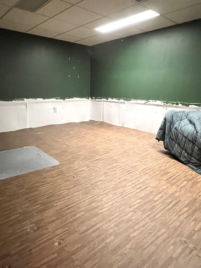 5425 Westchester Dr, Flint, MI 48532 - spare room featuring a drop ceiling and wood finished floors
