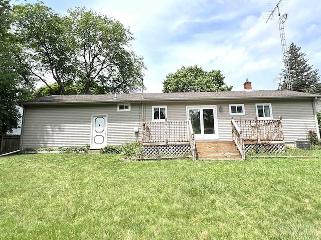 5425 Westchester Dr, Flint, MI 48532 - rear view of property with a wooden deck and a chimney