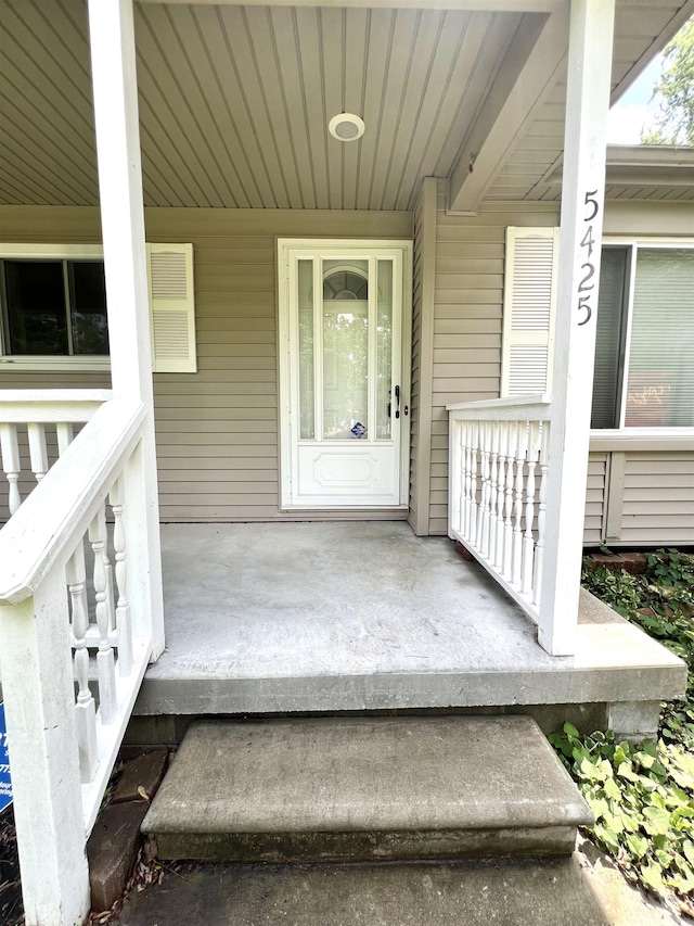 5425 Westchester Dr, Flint, MI 48532 - view of exterior entry with a porch