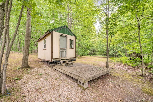 122 Canyon Rd, Leroy, MI 49655 - view of outbuilding featuring a forest view