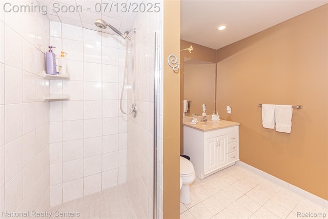 285 Ash Ct, South Lyon, MI 48178 - bathroom featuring a tile shower, vanity, and tile patterned floors