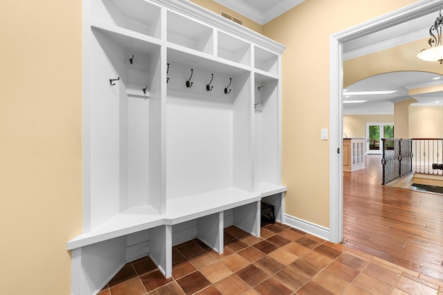 1431 Edgemoor Ave, Kalamazoo, MI 49008 - mudroom with crown molding and arched walkways