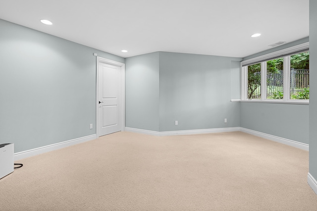 1431 Edgemoor Ave, Kalamazoo, MI 49008 - spare room with light colored carpet and recessed lighting