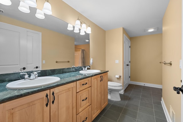 1431 Edgemoor Ave, Kalamazoo, MI 49008 - bathroom with double vanity, tile patterned flooring, and a shower with shower curtain