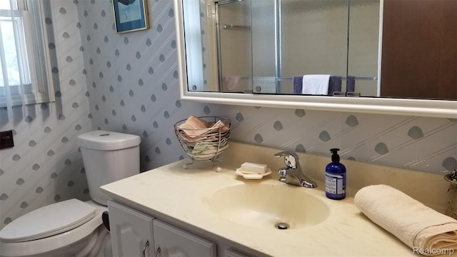 5396 Provincial Dr, Bloomfield Hills, MI 48302 - bathroom featuring vanity, wallpapered walls, and a shower with door