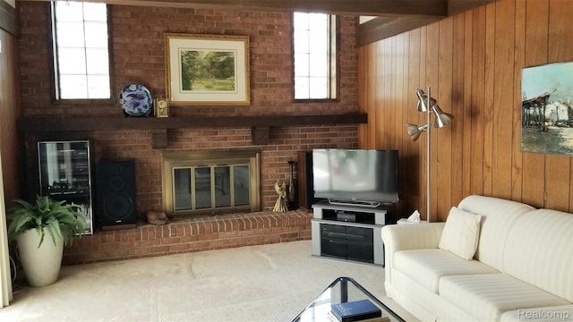 5396 Provincial Dr, Bloomfield Hills, MI 48302 - living area with wood walls, carpet floors, and a fireplace