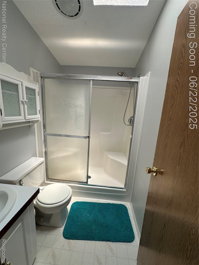 8049 Mckinley Rd, Clay, MI 48001 - bathroom featuring a stall shower, vanity, and a textured ceiling
