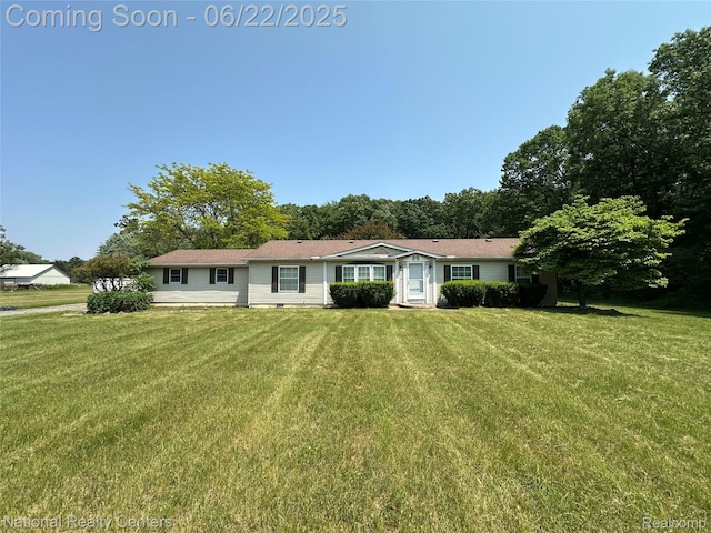 8049 Mckinley Rd, Clay, MI 48001 - ranch-style home with a front yard