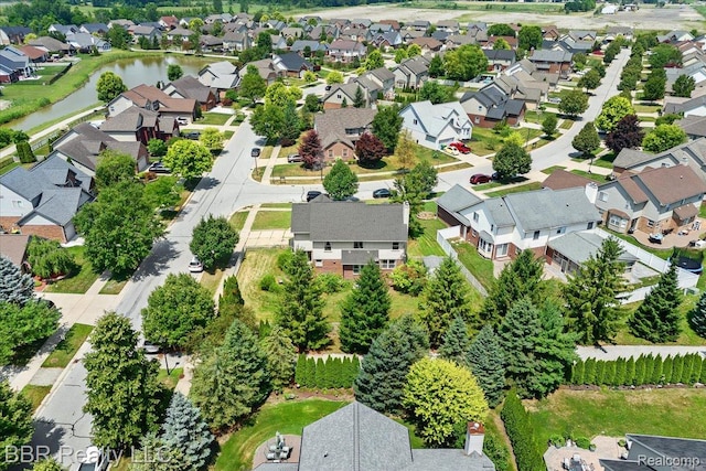 20077 Dovetail Dr, Brownstown, MI 48183 - aerial view of residential area featuring a large body of water