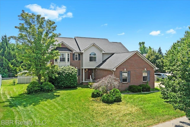 20077 Dovetail Dr, Brownstown, MI 48183 - traditional-style home with brick siding and roof with shingles