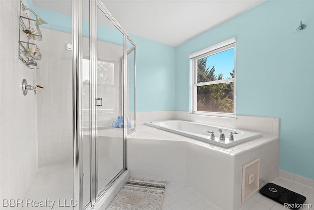 20077 Dovetail Dr, Brownstown, MI 48183 - bathroom featuring a stall shower, a garden tub, and tile patterned flooring