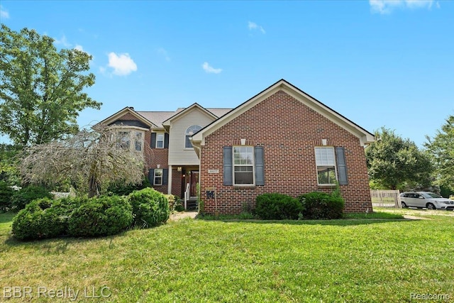 20077 Dovetail Dr, Brownstown, MI 48183 - view of front of house featuring brick siding and a front lawn