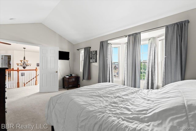 20077 Dovetail Dr, Brownstown, MI 48183 - carpeted bedroom featuring vaulted ceiling and a chandelier
