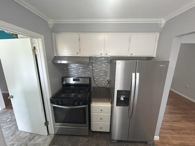 9262 Washington St, Romulus, MI 48174 - kitchen with stainless steel appliances, under cabinet range hood, ornamental molding, backsplash, and white cabinetry