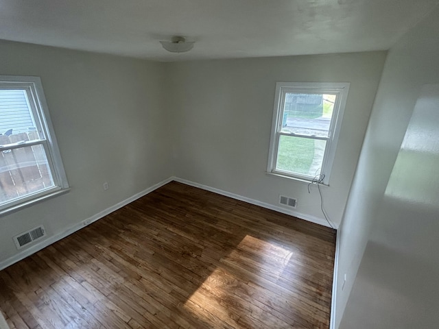 9262 Washington St, Romulus, MI 48174 - unfurnished room featuring dark wood-style flooring