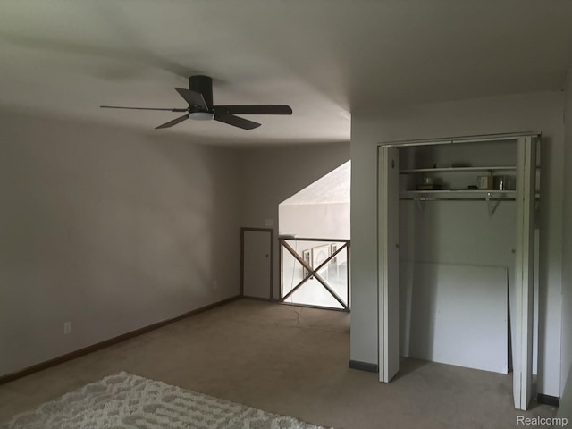 5636 Crescent St, Norway, MI 49870 - unfurnished bedroom with carpet flooring, a closet, and ceiling fan