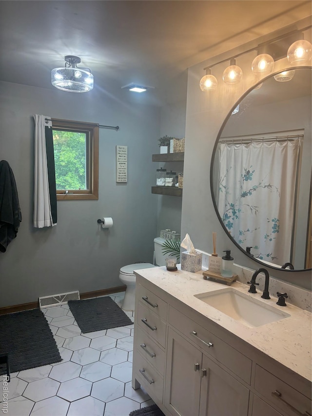 5636 Crescent St, Norway, MI 49870 - bathroom with vanity and tile patterned flooring