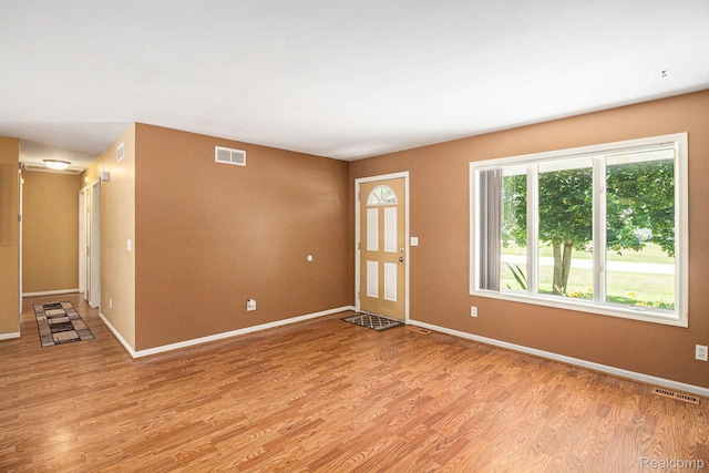 4788 Apache Trl, Columbiaville, MI 48421 - entrance foyer featuring light wood finished floors and baseboards