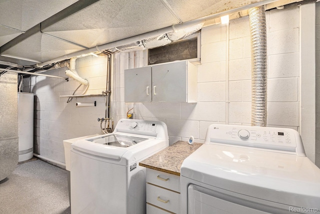4788 Apache Trl, Columbiaville, MI 48421 - laundry room with cabinet space, washer and dryer, and water heater