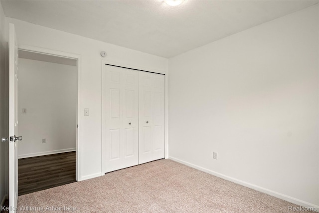 41215 Westfield Cir, Canton, MI 48188 - unfurnished bedroom featuring carpet floors and a closet