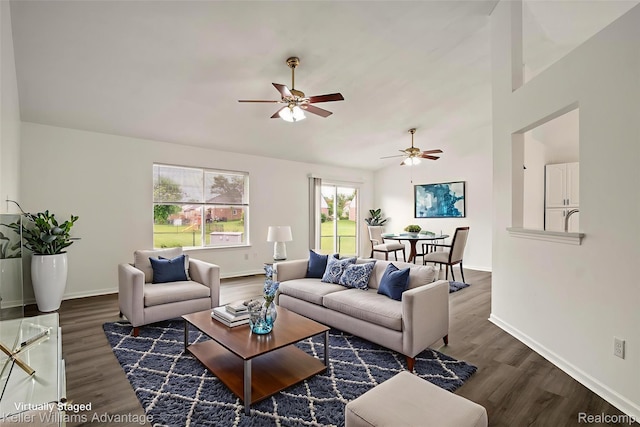 41215 Westfield Cir, Canton, MI 48188 - living area featuring ceiling fan, wood finished floors, and vaulted ceiling