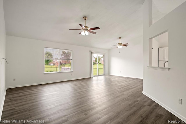 41215 Westfield Cir, Canton, MI 48188 - empty room featuring a ceiling fan, dark wood-style flooring, and vaulted ceiling