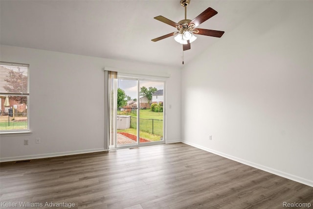 41215 Westfield Cir, Canton, MI 48188 - empty room featuring wood finished floors, lofted ceiling, and ceiling fan