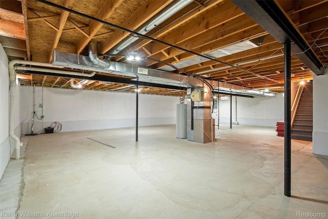 41215 Westfield Cir, Canton, MI 48188 - unfinished basement featuring stairway and water heater