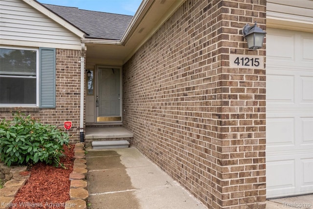 41215 Westfield Cir, Canton, MI 48188 - doorway to property with brick siding and roof with shingles