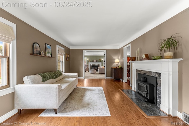 15275 Belmont Ave, Allen Park, MI 48101 - living room with a premium fireplace, healthy amount of natural light, and wood finished floors