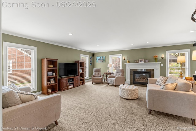 15275 Belmont Ave, Allen Park, MI 48101 - living room featuring crown molding, a tile fireplace, carpet, healthy amount of natural light, and recessed lighting