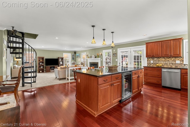 15275 Belmont Ave, Allen Park, MI 48101 - kitchen featuring stainless steel dishwasher, beverage cooler, dark countertops, a fireplace, and crown molding