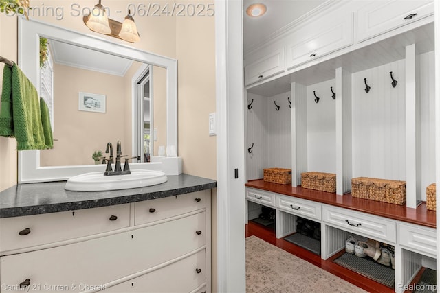 15275 Belmont Ave, Allen Park, MI 48101 - mudroom with ornamental molding and wood finished floors