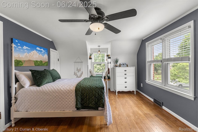 15275 Belmont Ave, Allen Park, MI 48101 - bedroom with wood-type flooring, ceiling fan, and ornamental molding