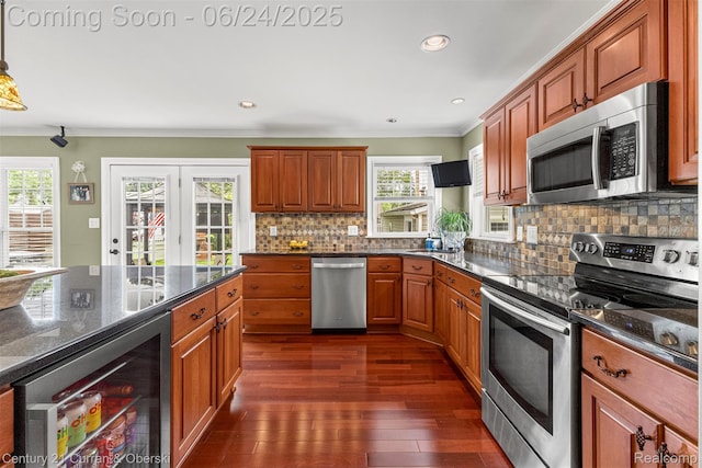 15275 Belmont Ave, Allen Park, MI 48101 - kitchen featuring appliances with stainless steel finishes, beverage cooler, crown molding, dark wood-type flooring, and backsplash