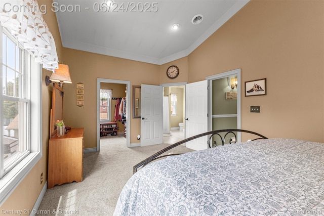 15275 Belmont Ave, Allen Park, MI 48101 - bedroom featuring a walk in closet, carpet, a closet, and ensuite bath