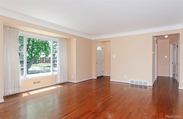 16555 Juliana Ave, Eastpointe, MI 48021 - unfurnished room featuring wood finished floors and baseboards