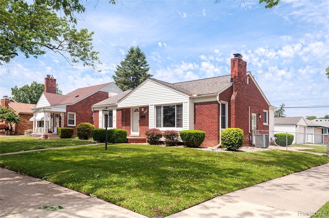 16555 Juliana Ave, Eastpointe, MI 48021 - view of front facade with brick siding, a chimney, and a shingled roof
