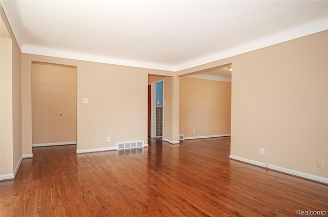 16555 Juliana Ave, Eastpointe, MI 48021 - unfurnished room with wood finished floors and baseboards