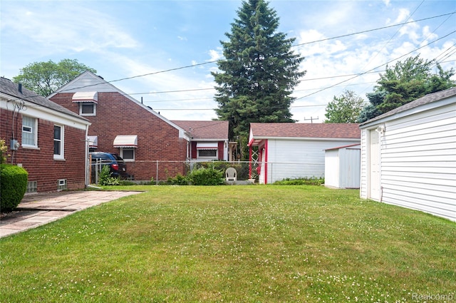 16555 Juliana Ave, Eastpointe, MI 48021 - view of yard with a storage unit
