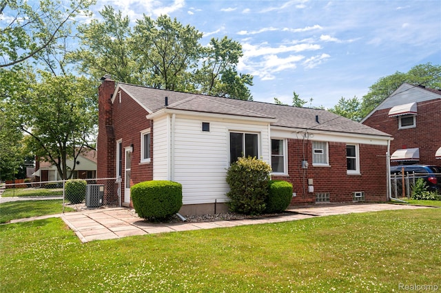 16555 Juliana Ave, Eastpointe, MI 48021 - rear view of property with a chimney and a patio