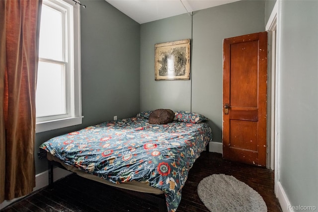 7824 Mount Elliott St, Detroit, MI 48211 - bedroom with baseboards and wood finished floors