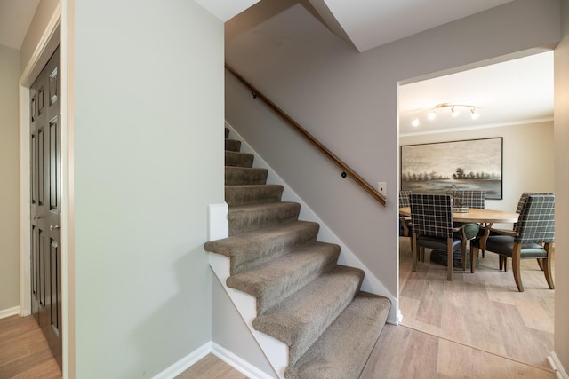 6615 Pleasantview Dr, Portage, MI 49024 - stairs with wood finished floors and crown molding