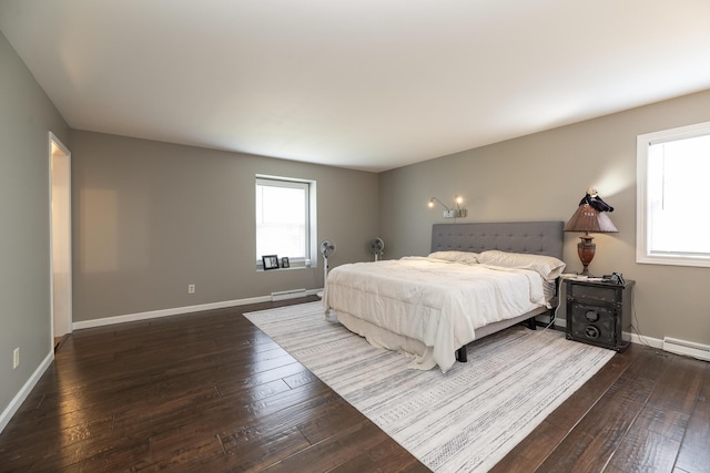 6615 Pleasantview Dr, Portage, MI 49024 - bedroom featuring dark wood-style flooring, multiple windows, and a baseboard radiator
