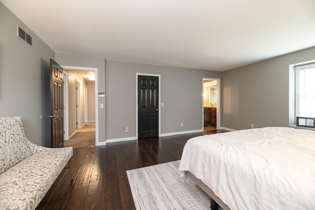 6615 Pleasantview Dr, Portage, MI 49024 - bedroom with dark wood-style flooring and ensuite bath