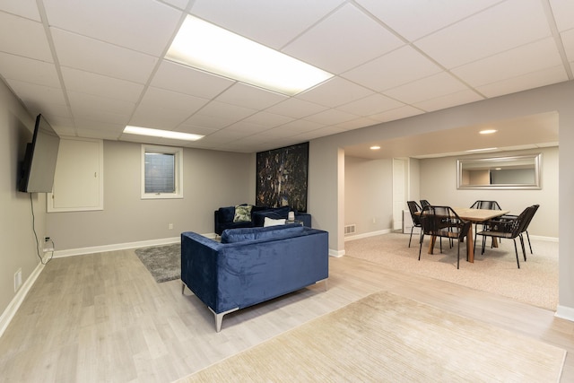 6615 Pleasantview Dr, Portage, MI 49024 - living room featuring light wood-style flooring and a drop ceiling