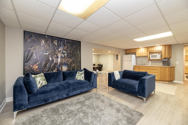 6615 Pleasantview Dr, Portage, MI 49024 - living area featuring light wood finished floors and a drop ceiling