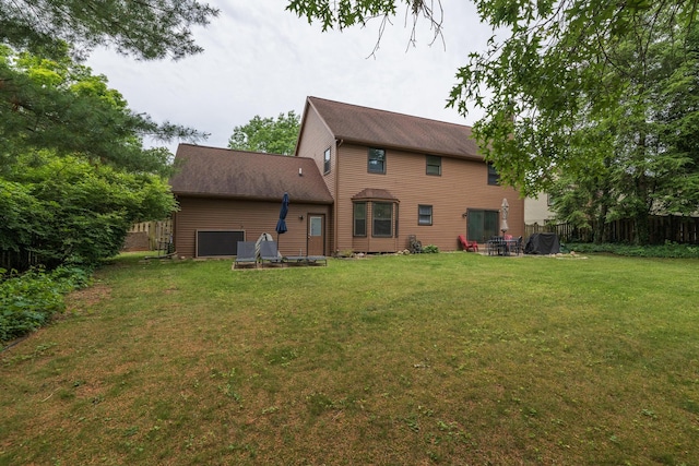 6615 Pleasantview Dr, Portage, MI 49024 - back of house featuring a garage