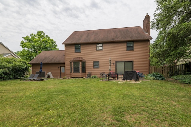 6615 Pleasantview Dr, Portage, MI 49024 - rear view of house featuring a chimney and a patio