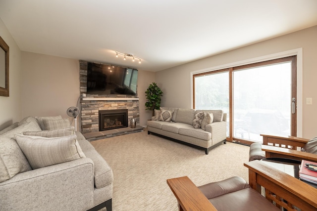 6615 Pleasantview Dr, Portage, MI 49024 - living area with a stone fireplace and carpet floors